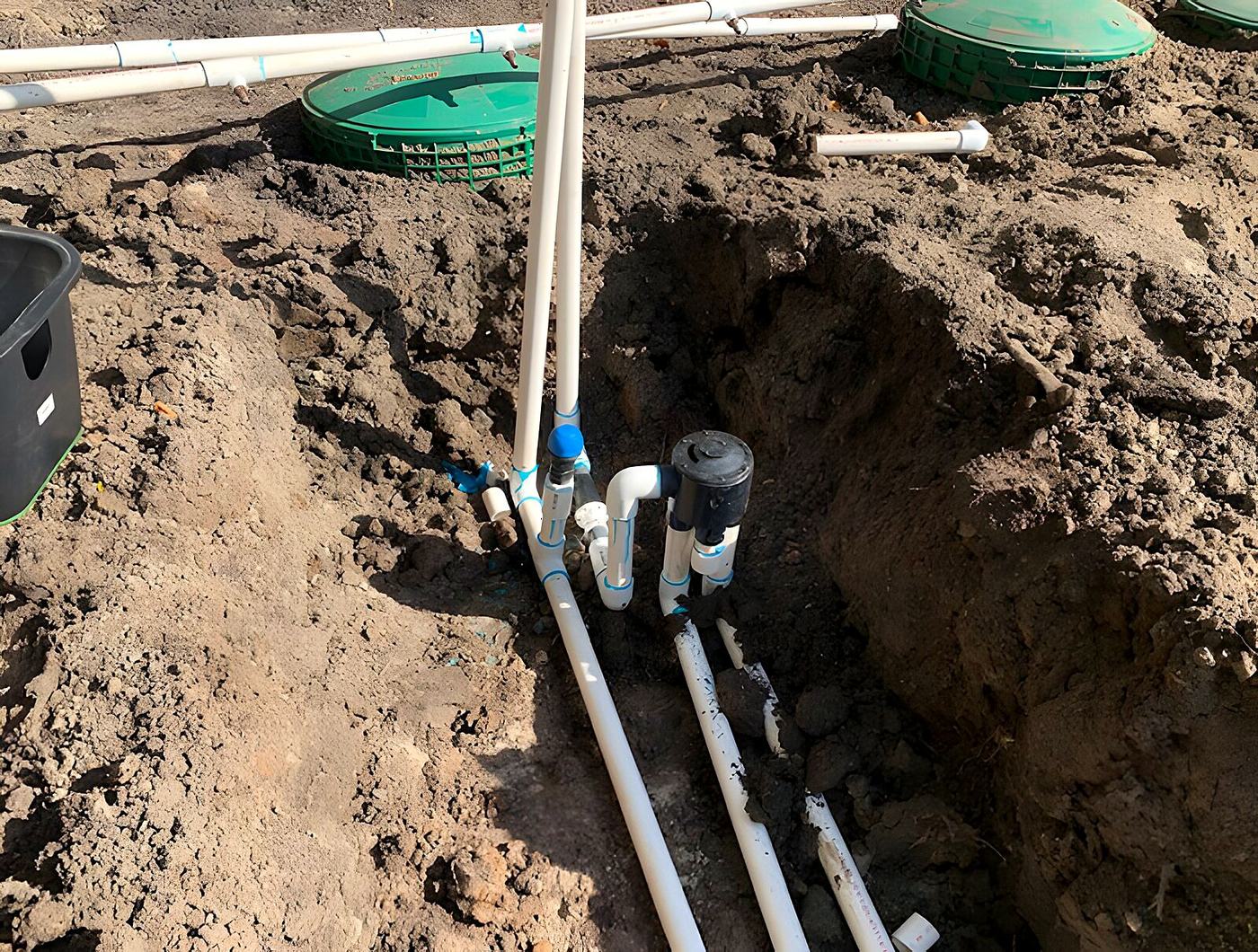 Valve manifold and pump float assembly in a freshly dug pit